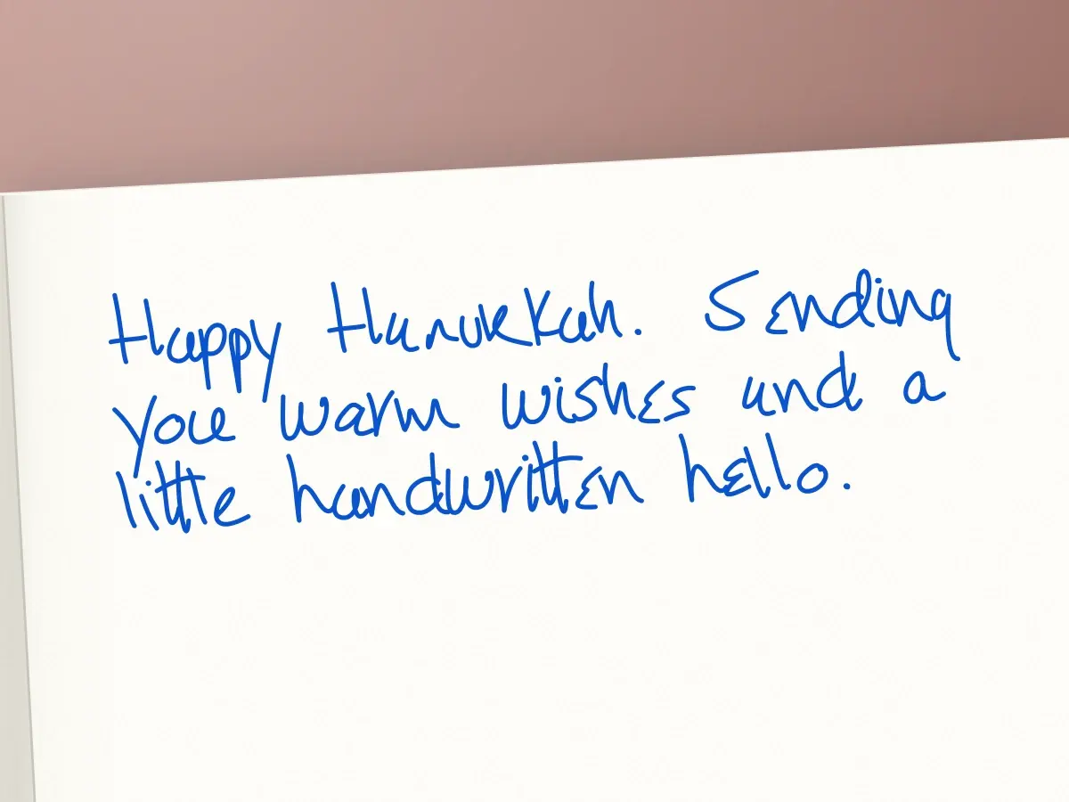 Handwritten card in Olive: Happy Hanukkah. Sending you warm wishes and a little handwritten hello.