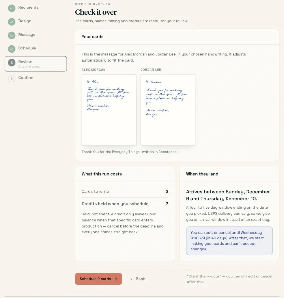Final review of the two-card client thank-you mailing before scheduling.