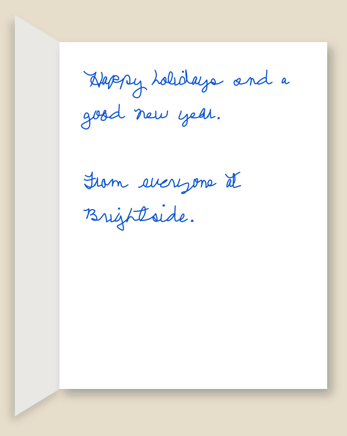 The inside of a handwritten card reading: Happy holidays and a good new year. From everyone at Brightside.