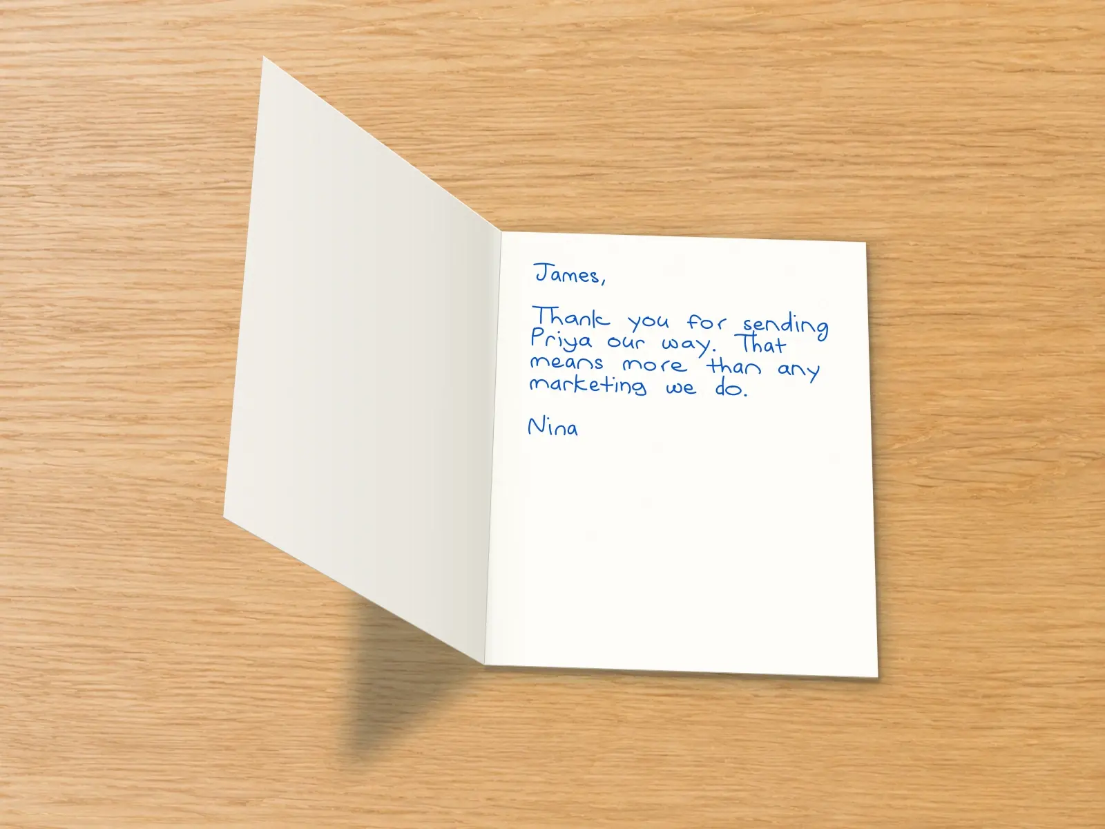 The inside of a handwritten card reading: James, Thank you for sending Priya our way. That means more than any marketing we do. Nina