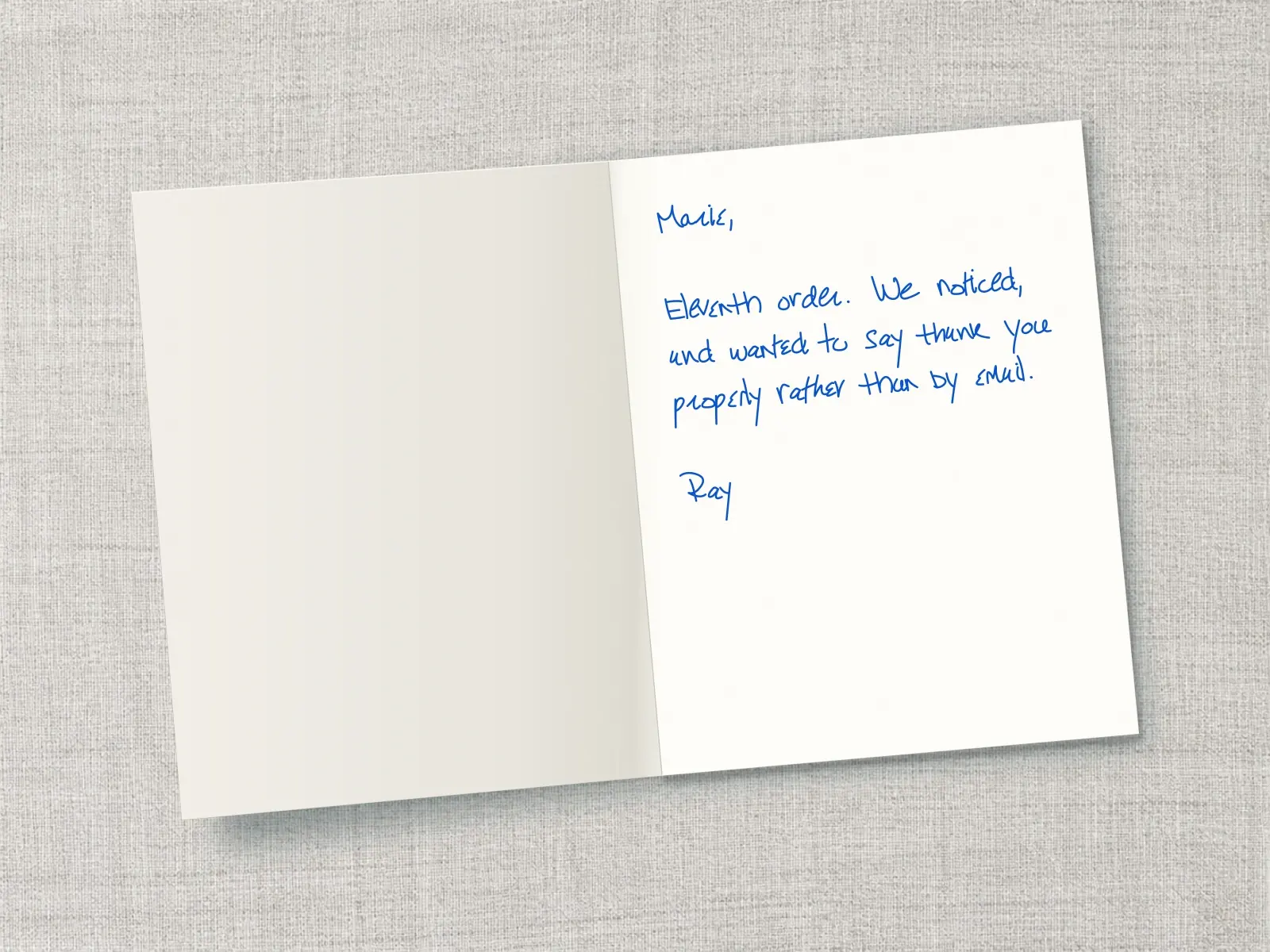 The inside of a handwritten card reading: Marie, Eleventh order. We noticed, and wanted to say thank you properly rather than by email. Ray