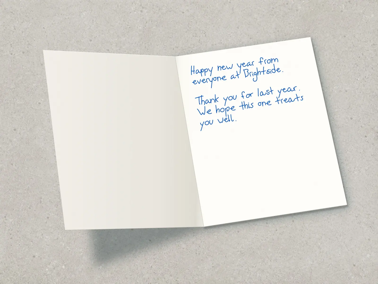The inside of a handwritten card reading: Happy new year from everyone at Brightside. Thank you for last year. We hope this one treats you well.