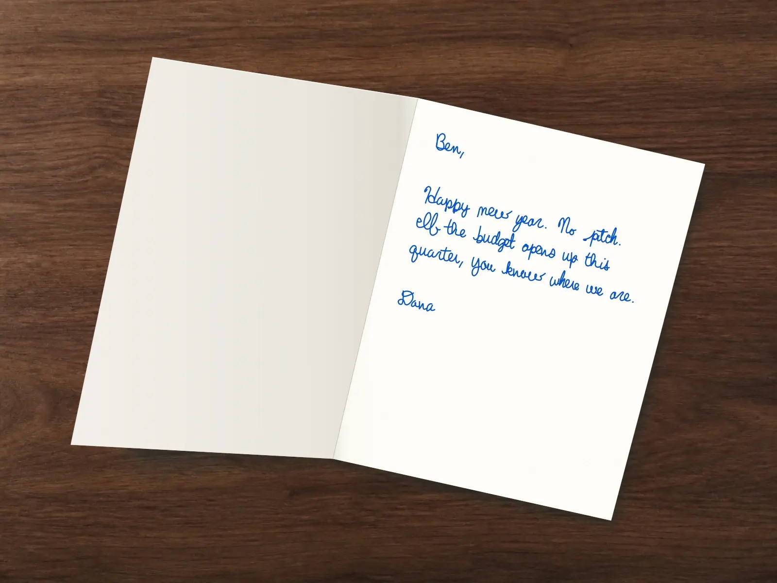 The inside of a handwritten card reading: Ben, Happy new year. No pitch. If the budget opens up this quarter, you know where we are. Dana