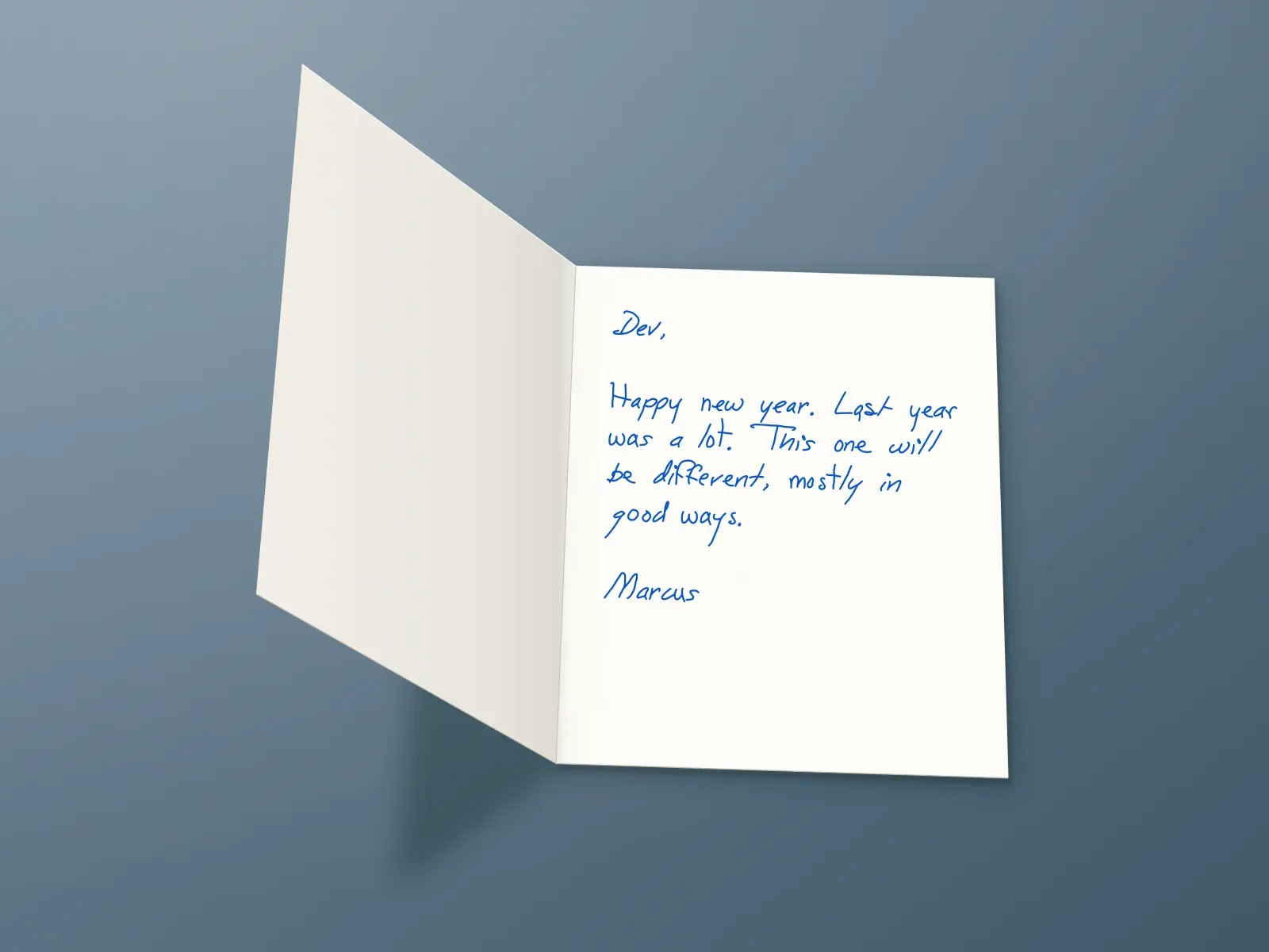 The inside of a handwritten card reading: Dev, Happy new year. Last year was a lot. This one will be different, mostly in good ways. Marcus