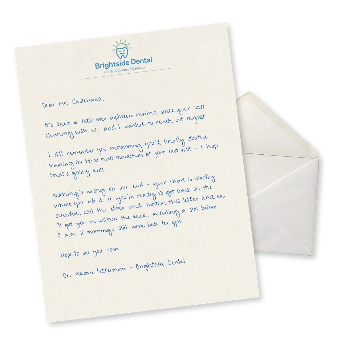 A real handwritten letter from Brightside Dental in blue ink beside its hand-addressed, stamped envelope
