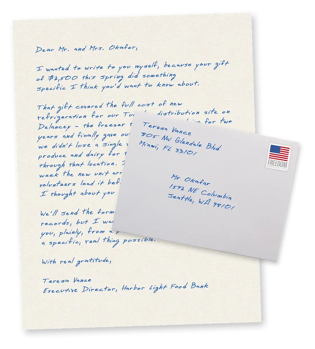 A real handwritten thank-you letter in blue ink beside its hand-addressed, stamped envelope