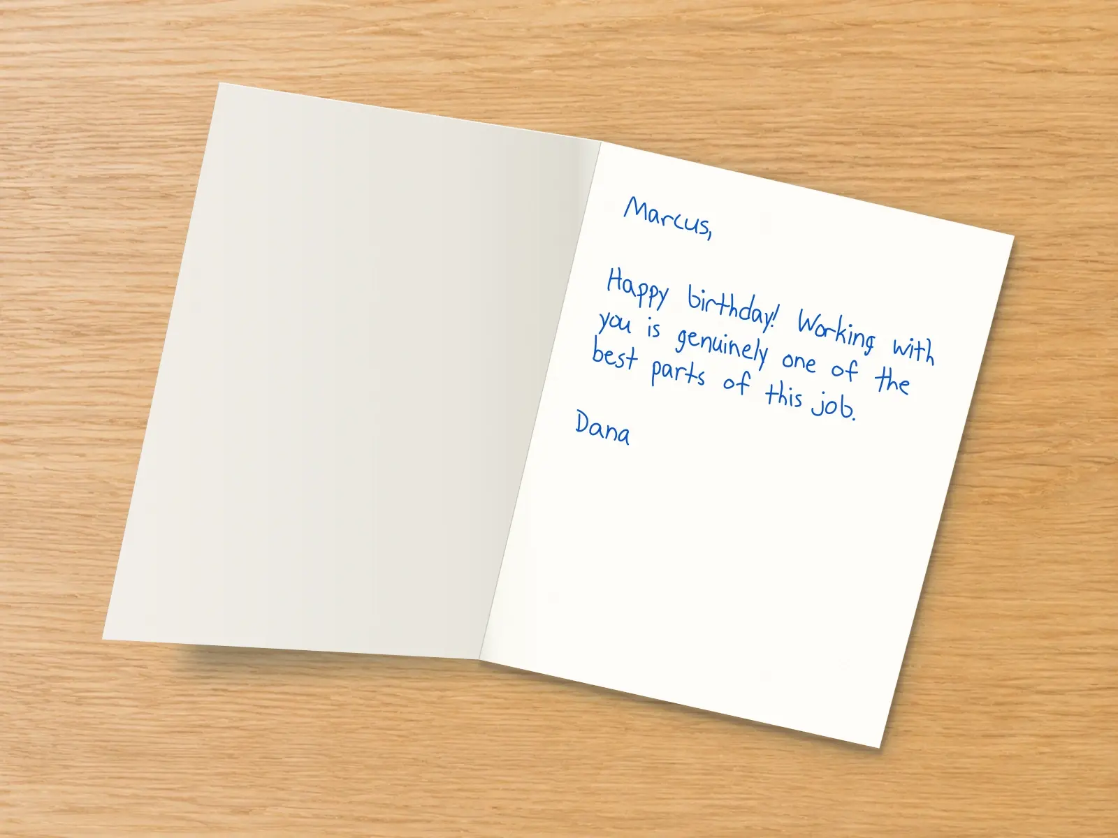 The inside of a handwritten card reading: Marcus, Happy birthday! Working with you is genuinely one of the best parts of this job. Dana