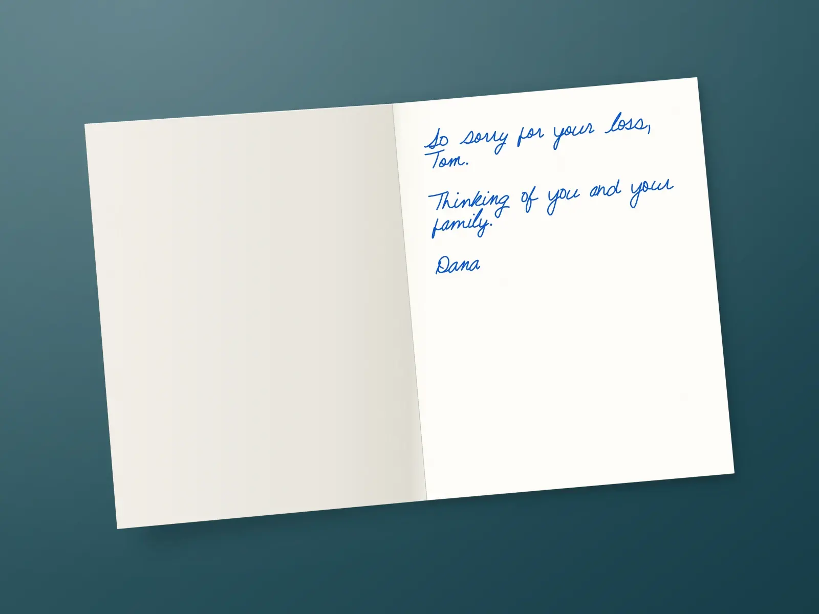 The inside of a handwritten card reading: So sorry for your loss, Tom. Thinking of you and your family. Dana