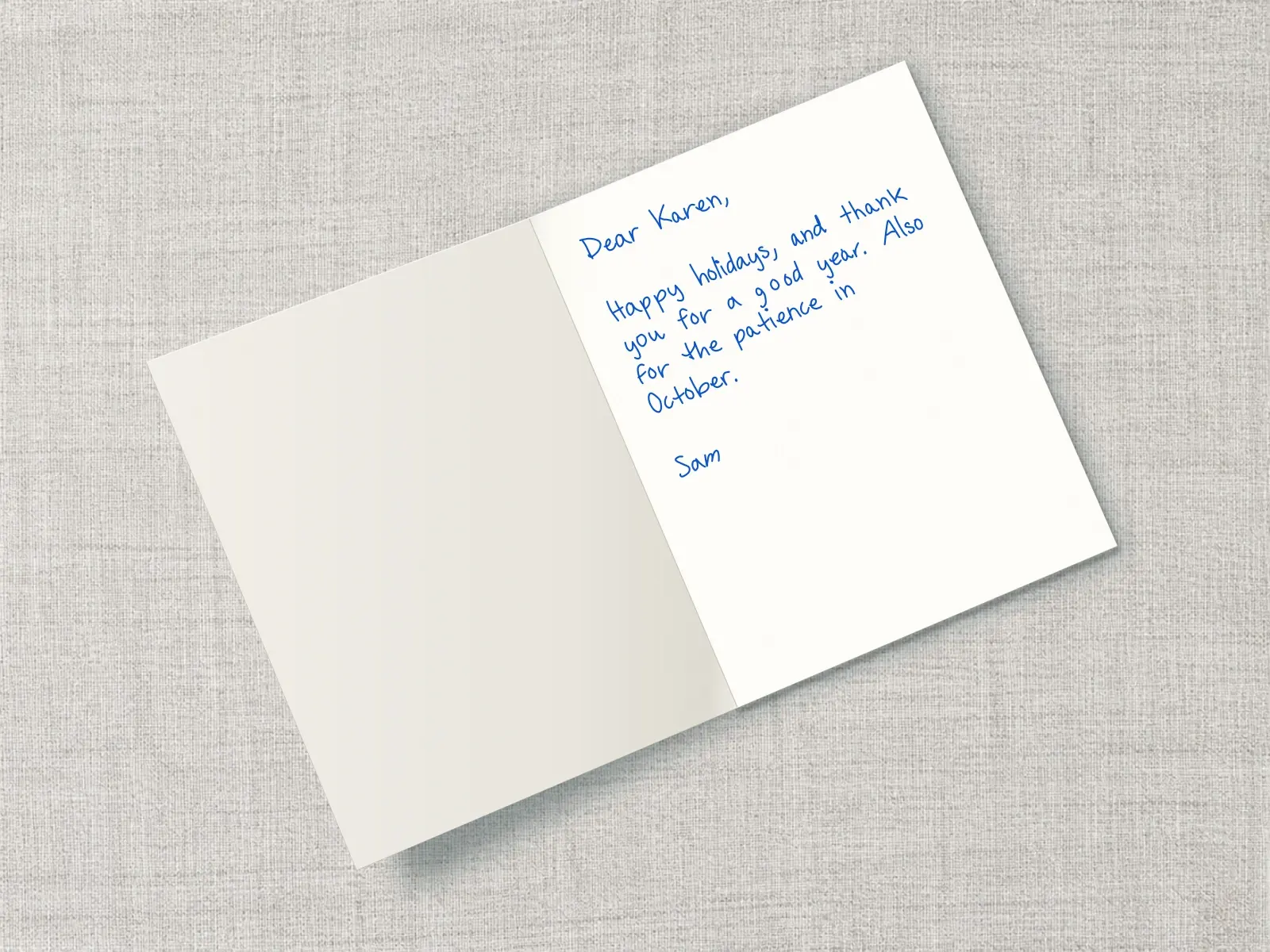 The inside of a handwritten card reading: Dear Karen, Happy holidays, and thank you for a good year. Also for the patience in October. Sam