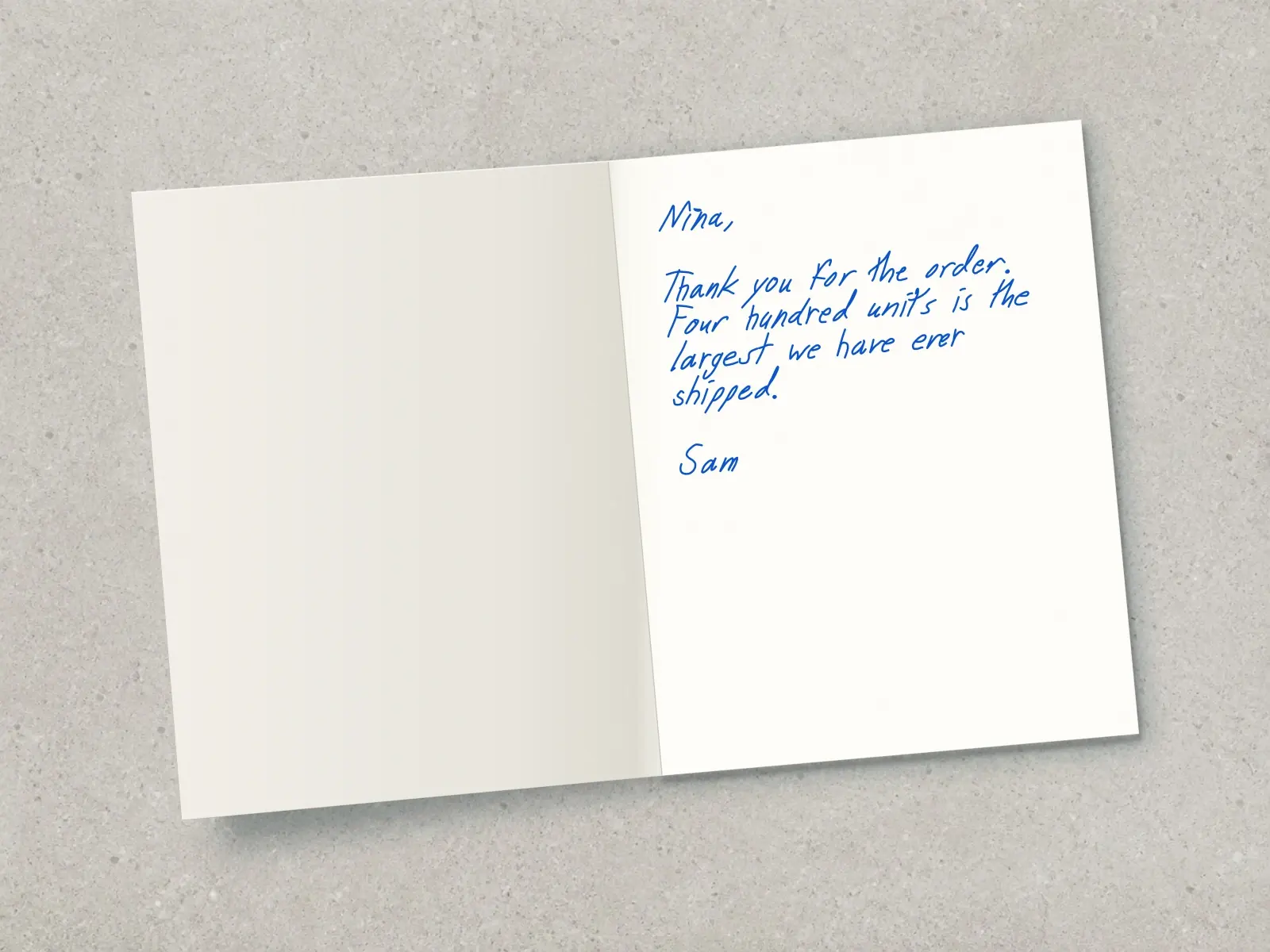 The inside of a handwritten card reading: Nina, Thank you for the order. Four hundred units is the largest we have ever shipped. Sam