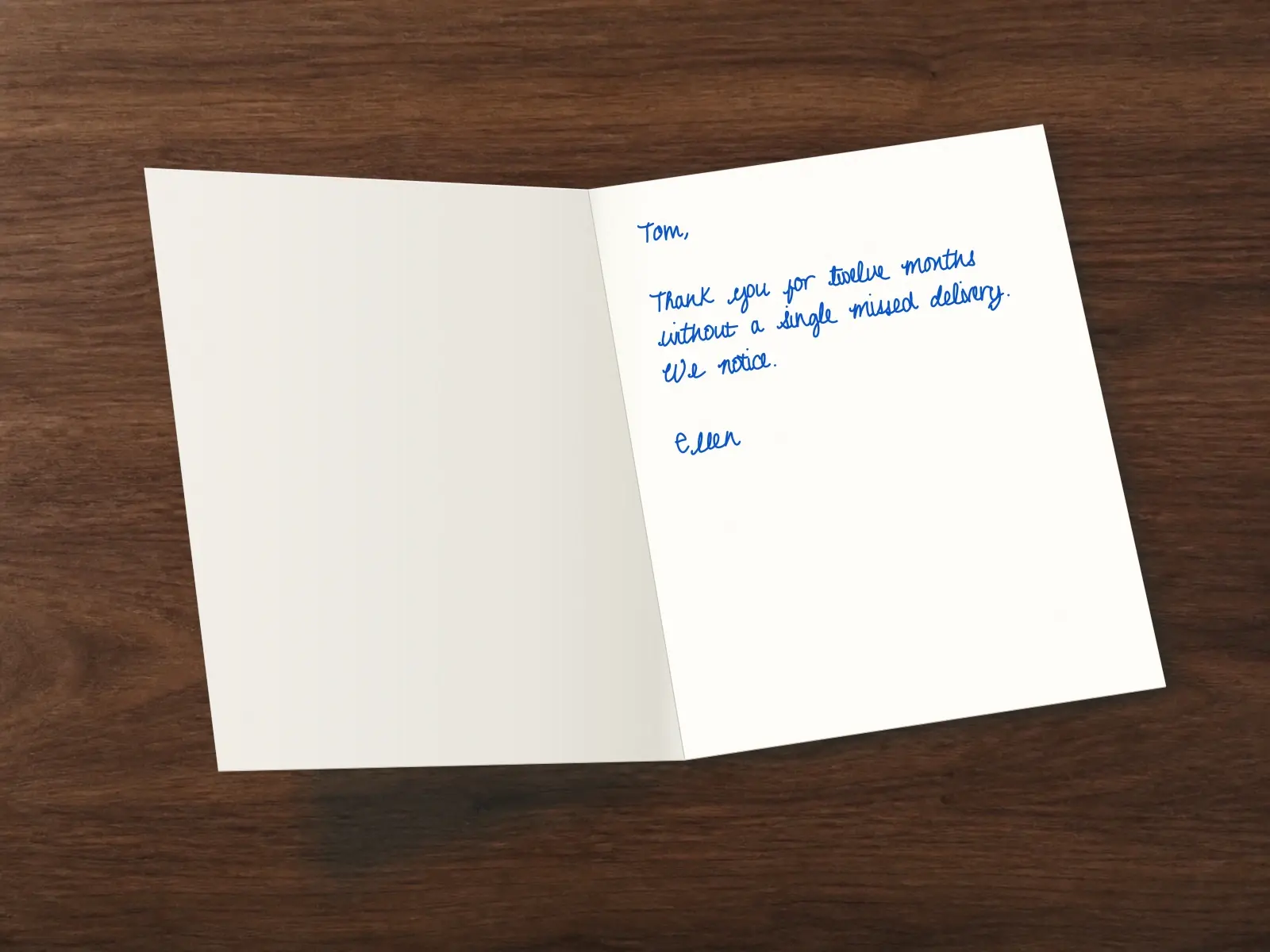 The inside of a handwritten card reading: Tom, Thank you for twelve months without a single missed delivery. We notice. Ellen